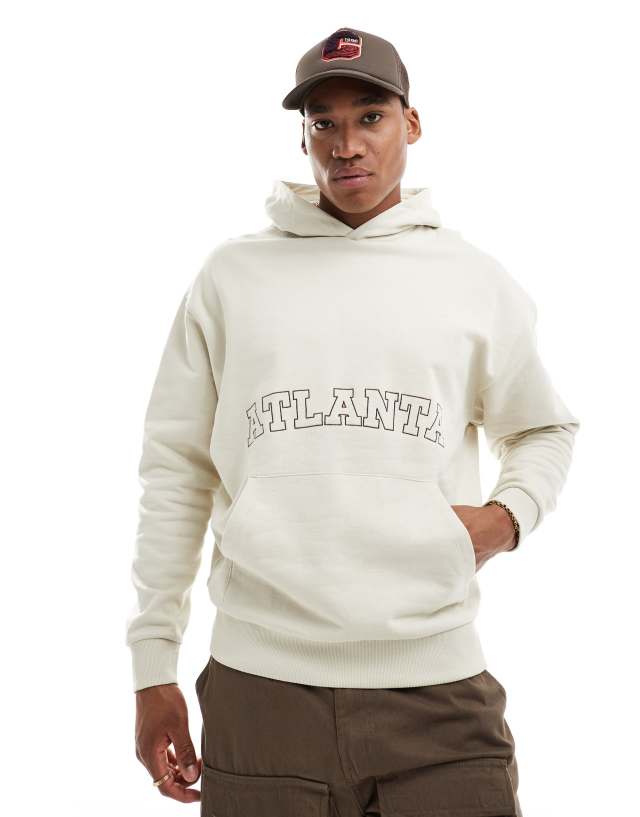 ASOS DESIGN - oversized hoodie in beige with front city embroidery print