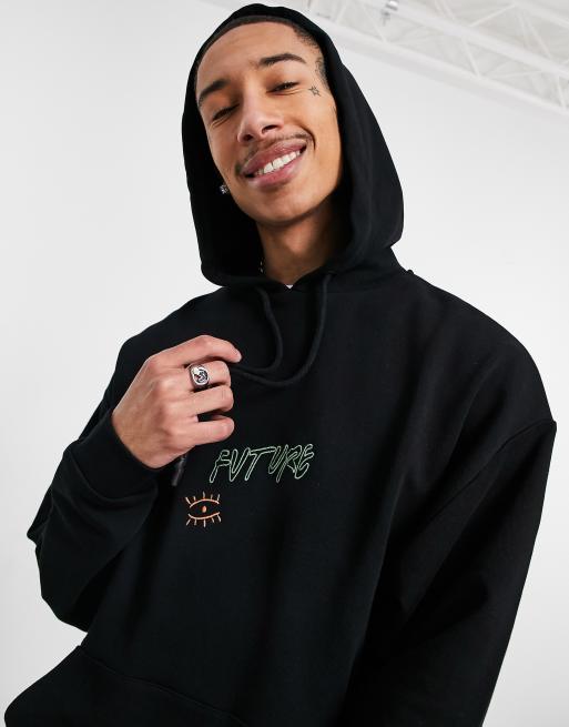 ASOS DESIGN oversized sweatshirt with NFL embroidery and back print in black