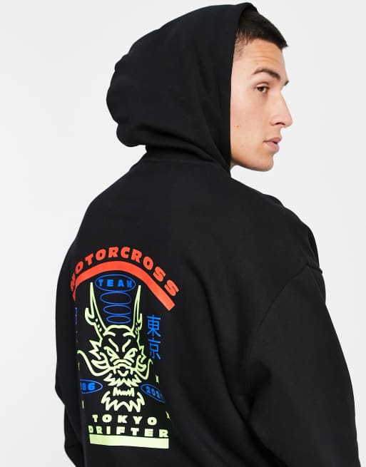 ASOS DESIGN oversized hoodie in black with motocross back print | ASOS