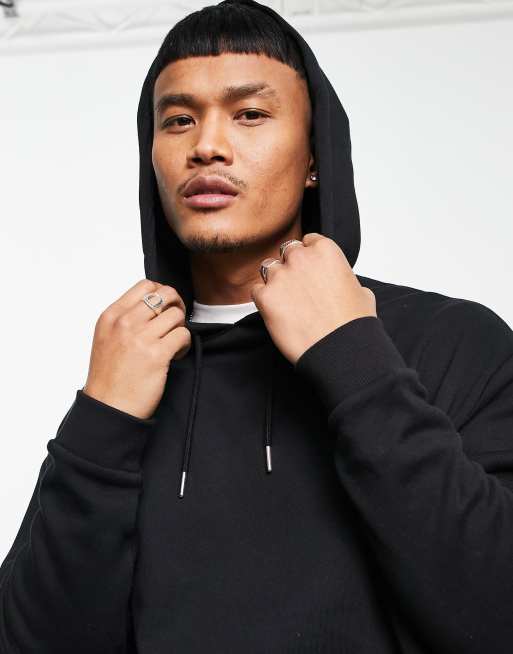 ASOS DESIGN oversized hoodie in black with photographic statue back print