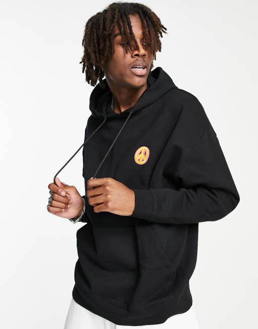 ASOS DESIGN oversized hoodie in black with small symbol embroidery part of a set