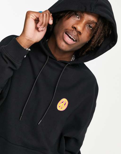 ASOS DESIGN oversized hoodie in black with small symbol embroidery part of a set