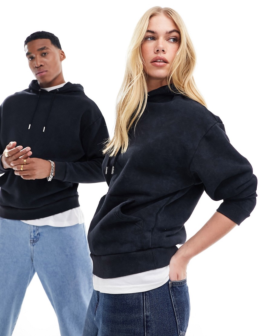 ASOS DESIGN oversized hoodie in black with snow wash detail