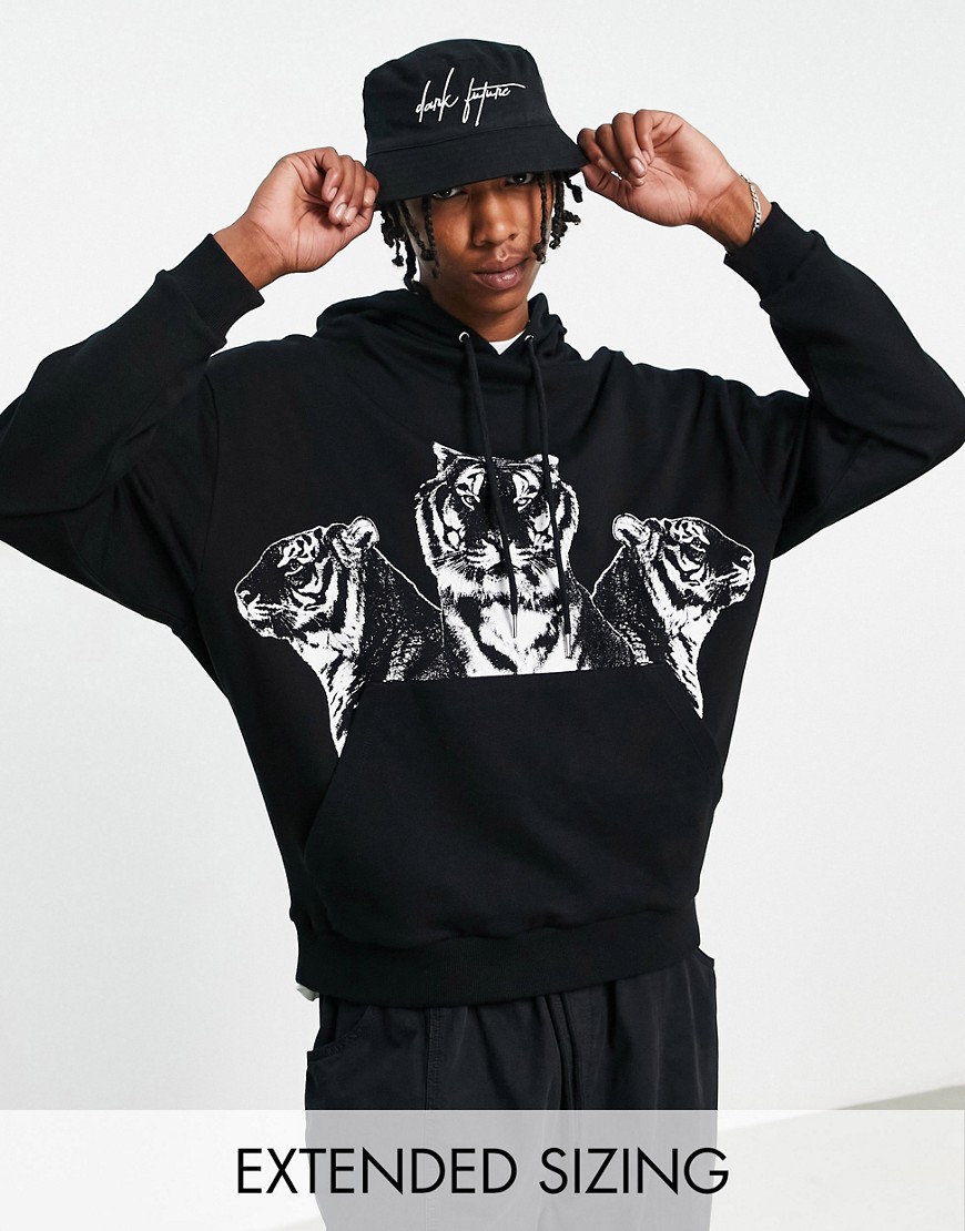 ASOS DESIGN oversized hoodie in black with tiger print