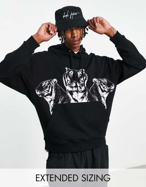 ASOS DESIGN oversized hoodie in black with tiger print | ASOS