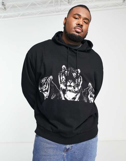 ASOS DESIGN oversized hoodie in black with tiger print | ASOS