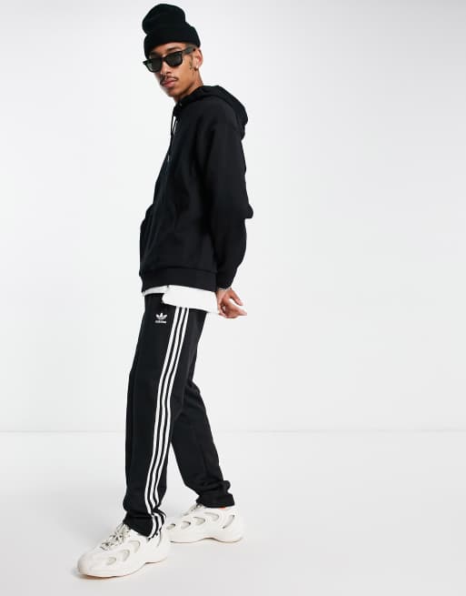 ASOS DESIGN organic tracksuit with oversized hoodie & oversized sweatpants  in black