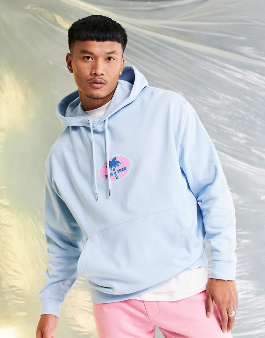 ASOS DESIGN oversized hoodie in blue with palm tree badge