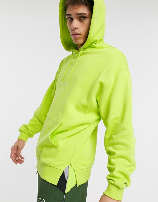 ASOS DESIGN oversized hoodie in bright lime with split hem