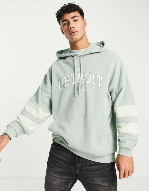 ASOS DESIGN oversized hoodie in collegiate colour block & acid wash in green