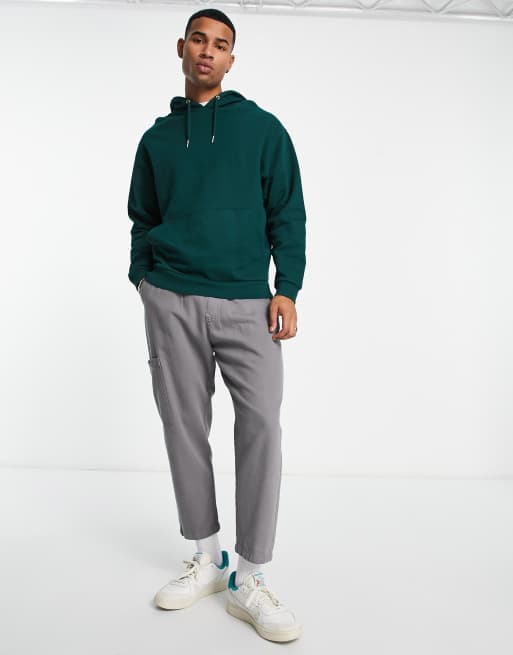 ASOS DESIGN oversized hoodie with Christmas Grinch print in green