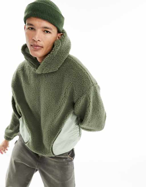 ASOS DESIGN oversized hoodie in green borg with nylon pocket detail