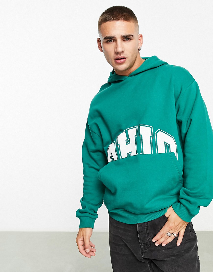 ASOS DESIGN oversized hoodie in green with collegiate pocket print