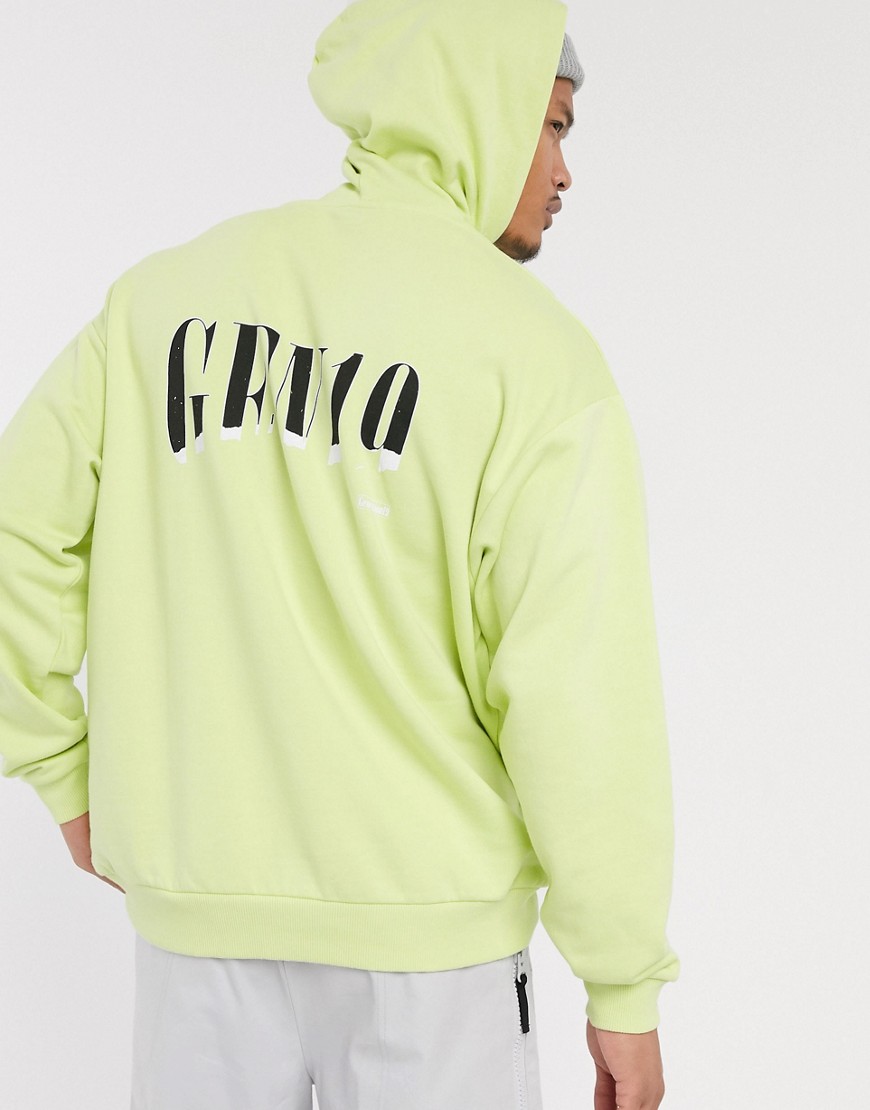 ASOS DESIGN - Oversized hoodie in groen met print achterop