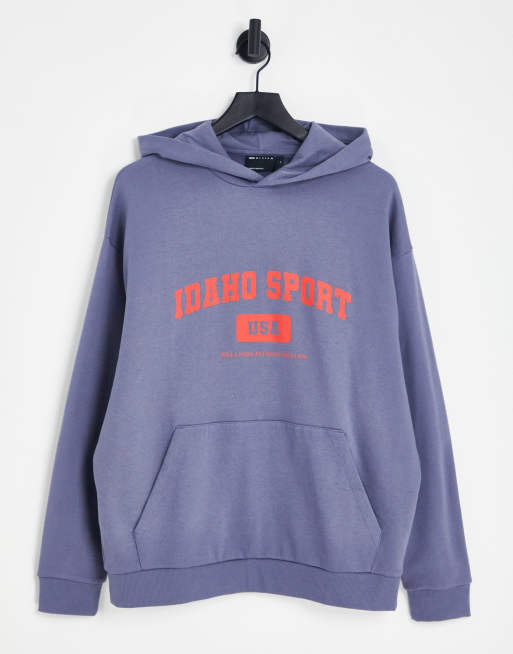 ASOS DESIGN oversized hoodie in navy with varsity print