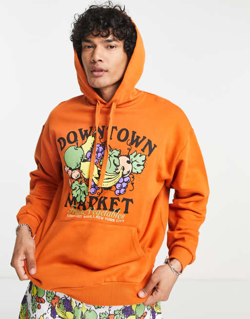 ASOS DESIGN oversized hoodie in orange with fruit print part of a set