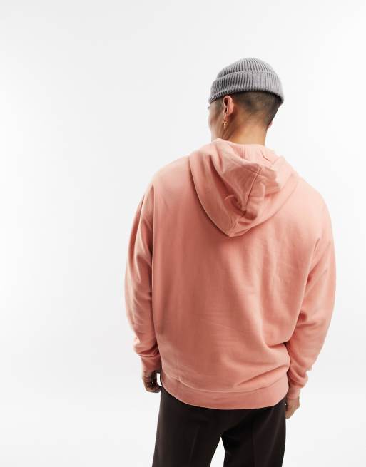 ASOS DESIGN oversized hoodie in pastel orange