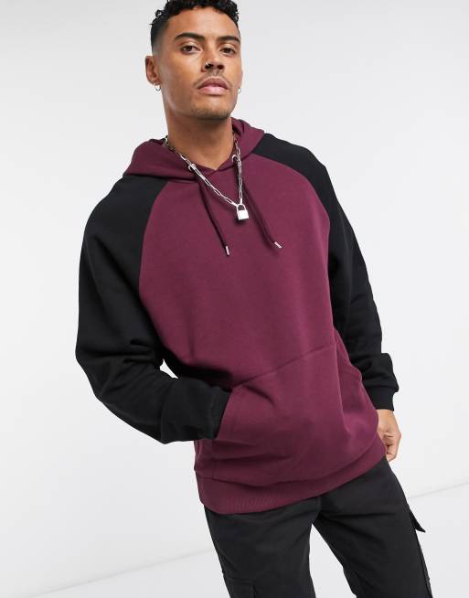 ASOS DESIGN oversized hoodie in plum with black sleeves