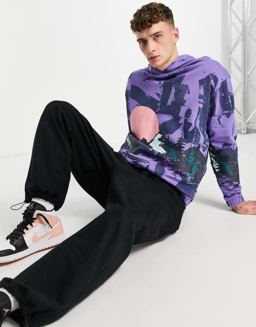 ASOS DESIGN oversized hoodie in purple with all over mountain