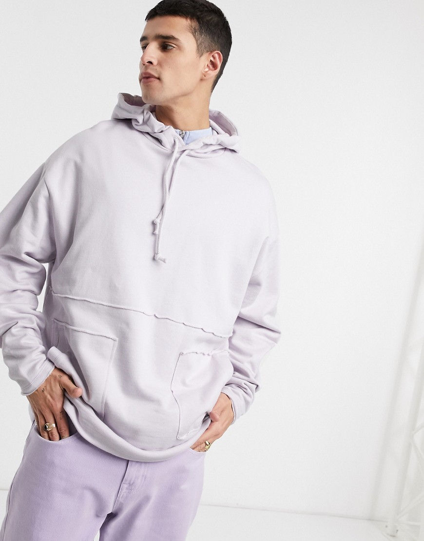 ASOS DESIGN oversized hoodie in purple with raw edge pockets