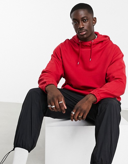 ASOS DESIGN oversized hoodie in red with insert hood