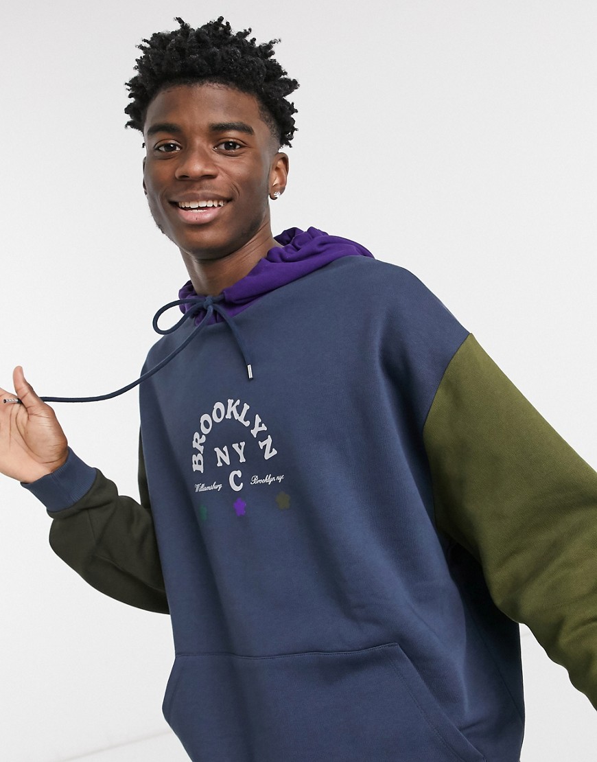 ASOS DESIGN oversized hoodie in retro colorblock with city front print-Navy