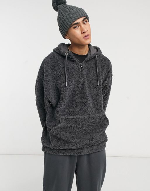 ASOS DESIGN oversized hoodie in washed black teddy fleece with half zip ...