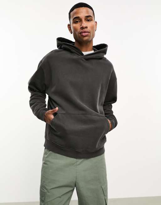 ASOS DESIGN oversized hoodie in washed black with souvenir back