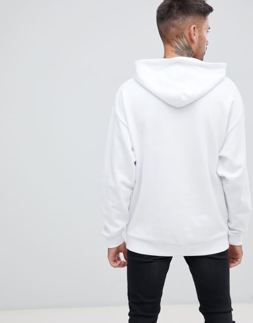 ASOS DESIGN oversized hoodie in off white with New York city skyline print