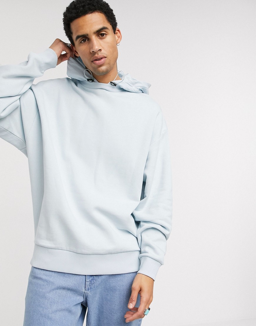 ASOS DESIGN - Oversized hoodie met nylon capuchon in lichtblauw-Grijs