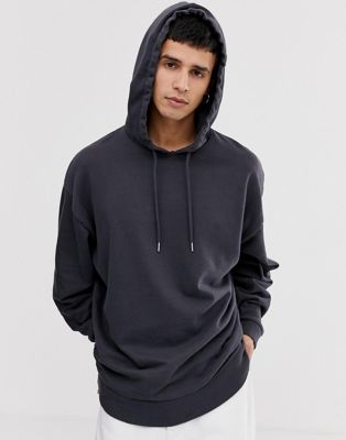 Niet genoeg actie korting ASOS DESIGN - Oversized hoodie met print op de achterkant en zwarte wassing  | ASOS