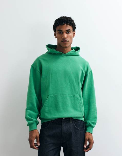 ASOS DESIGN oversized hoodie with acid wash in green - view 1