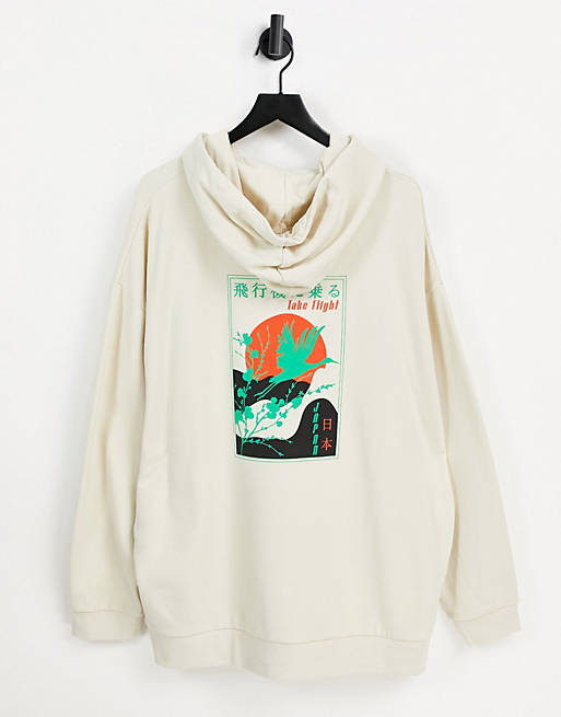 ASOS DESIGN oversized hoodie in beige with stork back print