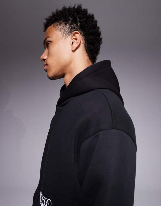 ASOS DESIGN oversized hoodie with bubble prints in black, 4 of 5