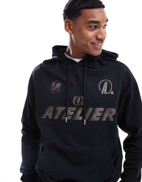 ASOS DESIGN oversized hoodie with chest print in black - view 1