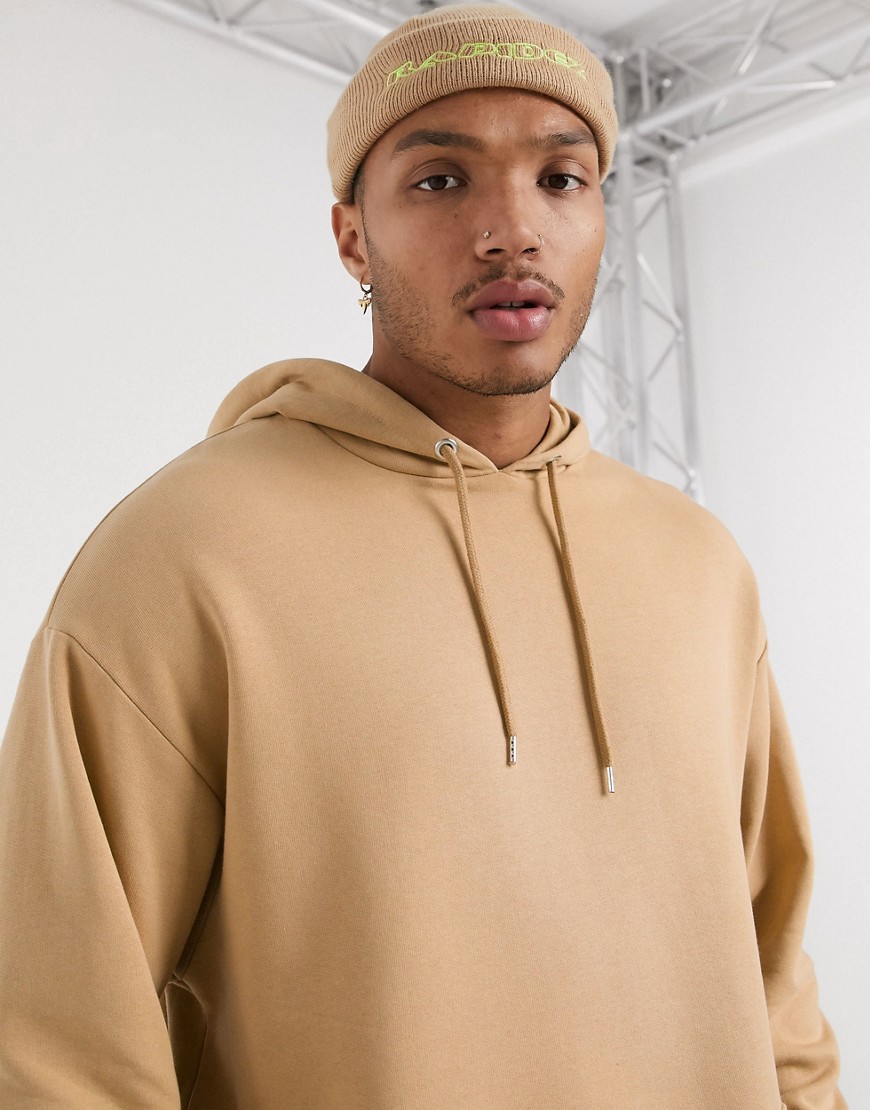 ASOS DESIGN oversized hoodie with curved hem in beige