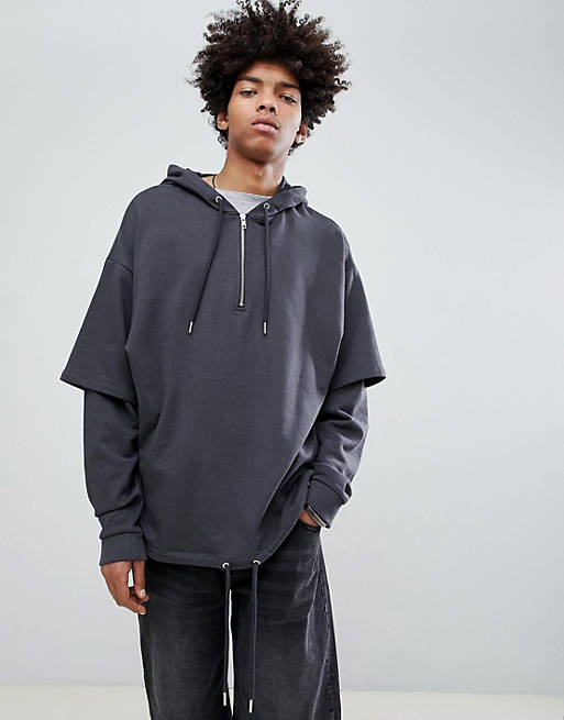 ASOS DESIGN oversized hoodie with drawstring hem and double layer sleeves  in washed black | ASOS