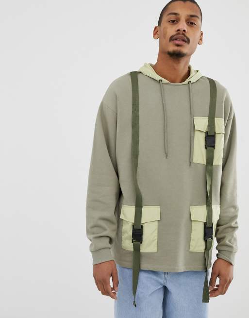 ASOS DESIGN oversized hoodie with military pockets and styling in green