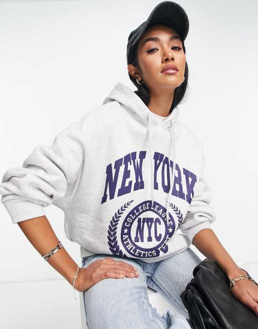 ASOS DESIGN oversized hoodie in off white with New York city skyline print