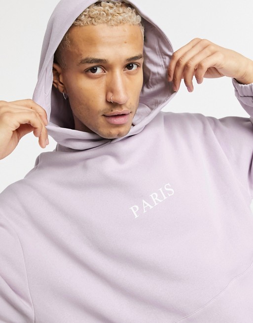 ASOS DESIGN oversized hoodie with Paris chest print and crossover hood detail