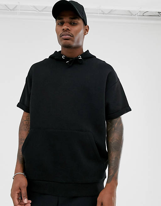 ASOS DESIGN oversized hoodie with raw sleeve in black | ASOS