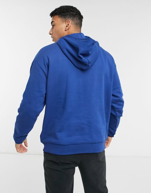 ASOS DESIGN oversized hoodie with square pockets in dark blue | ASOS