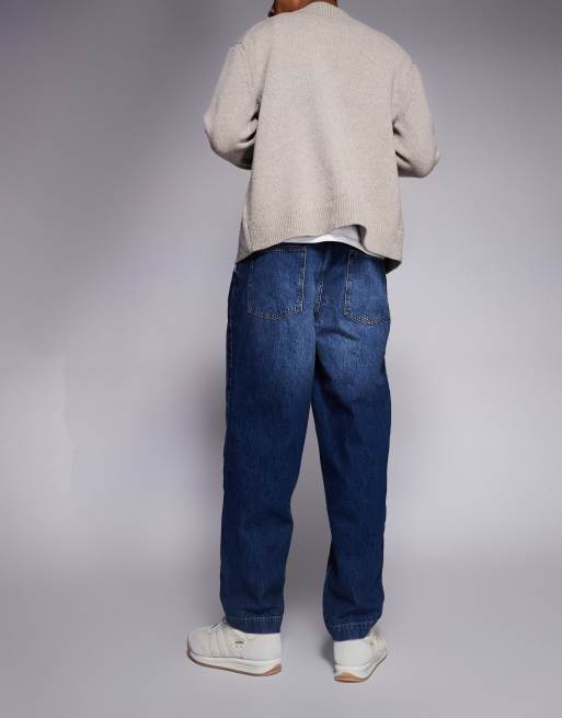 ASOS DESIGN – Oversized-Jeans in dunkler Waschung mit schmal zulaufendem Bein und Bundfalten, 3 von 5