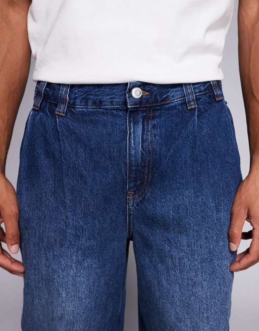 ASOS DESIGN - Oversized jeans met toelopende pasvorm en plooidetail in donkere wassing, 4 van 5