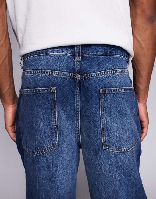 ASOS DESIGN - Oversized jeans met toelopende pasvorm en plooidetail in donkere wassing, 5 van 5