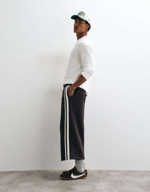 ASOS DESIGN oversized jeansshorts i lång modell med vävda band i brunt - BROWN, 3 av 5