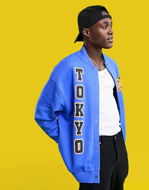 ASOS DESIGN oversized jersey bomber jacket in blue with Tokyo city prints, 2 of 4