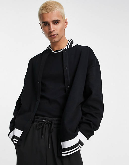 ASOS DESIGN oversized jersey bomber jacket with tipping in black | ASOS