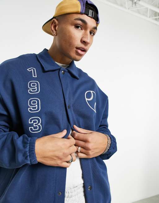 ASOS DESIGN oversized jersey coach jacket with collegiate prints