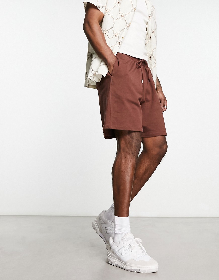 ASOS DESIGN oversized jersey mid length shorts in brown